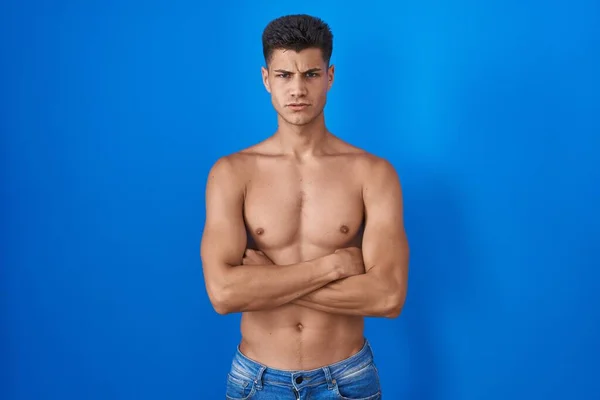 Young Hispanic Man Standing Shirtless Blue Background Skeptic Nervous Disapproving — Stock Photo, Image