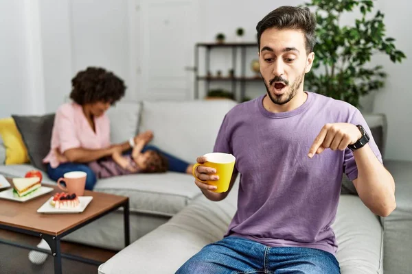 Hispanic Father Interracial Family Drinking Cup Coffee Pointing Fingers Showing —  Fotos de Stock