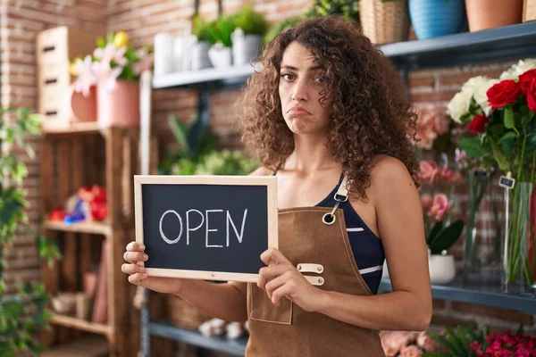 Hispanic Woman Curly Hair Working Florist Holding Open Sign Depressed — Stok fotoğraf