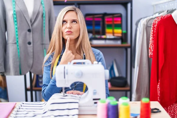 Blonde Woman Dressmaker Designer Using Sew Machine Thinking Concentrated Doubt — ストック写真