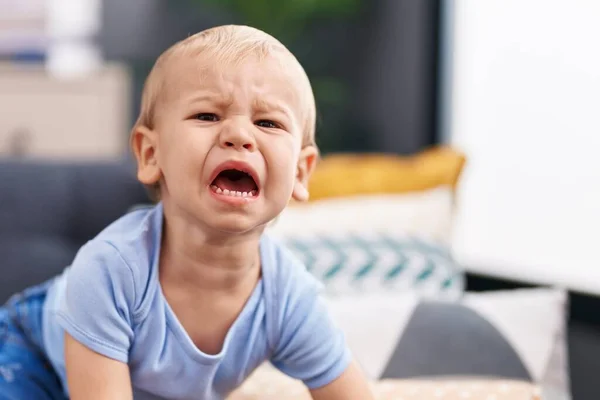 Adorable Toddler Sitting Sofa Crying Home — Stock Photo, Image