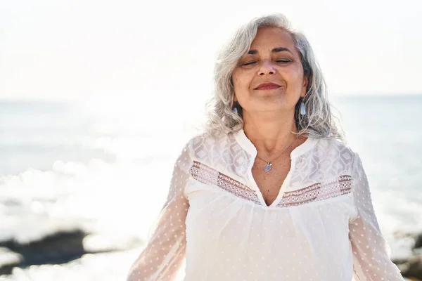 Middle Age Woman Smiling Confident Breathing Seaside — Stock Fotó