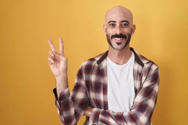 Hispanic Man Beard Standing Yellow Background Smiling Happy Face Winking — Fotografia de Stock