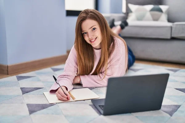 Young Caucasian Woman Lying Floor Studying Home — Stockfoto