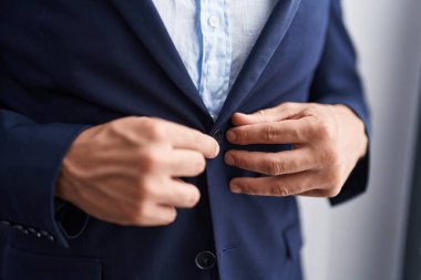 Young arab man business worker wearing jacket at street