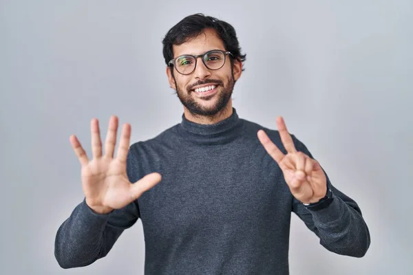 Handsome Latin Man Standing Isolated Background Showing Pointing Fingers Number — Stockfoto