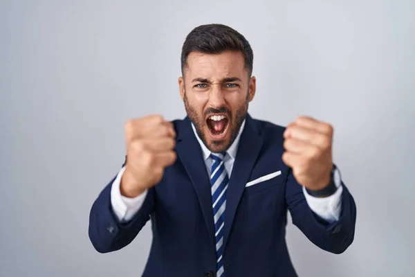 Handsome Hispanic Man Wearing Suit Tie Angry Mad Raising Fists — Stock Photo, Image