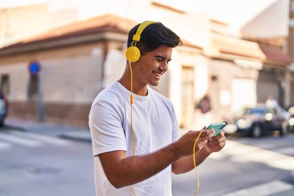 Young Hispanic Man Smiling Confident Playing Video Game Street — Stok Foto