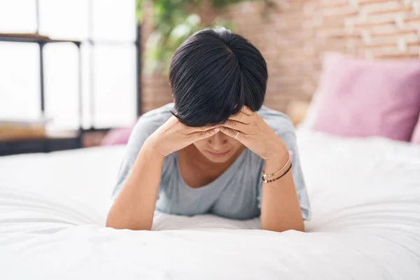 Middle Age Chinese Woman Stressed Lying Bed Bedroom — Stockfoto