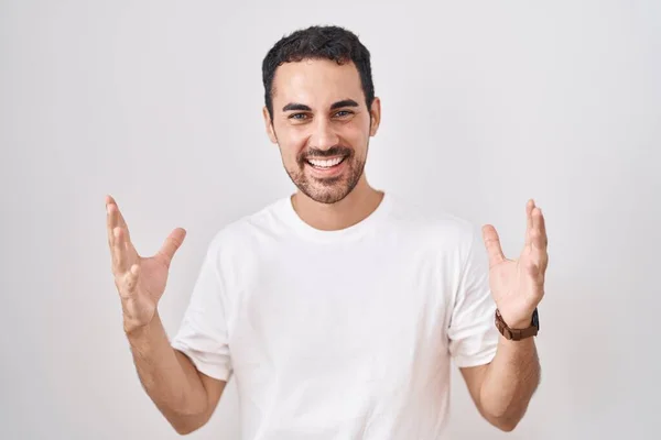 Handsome Hispanic Man Standing White Background Celebrating Mad Crazy Success — 图库照片