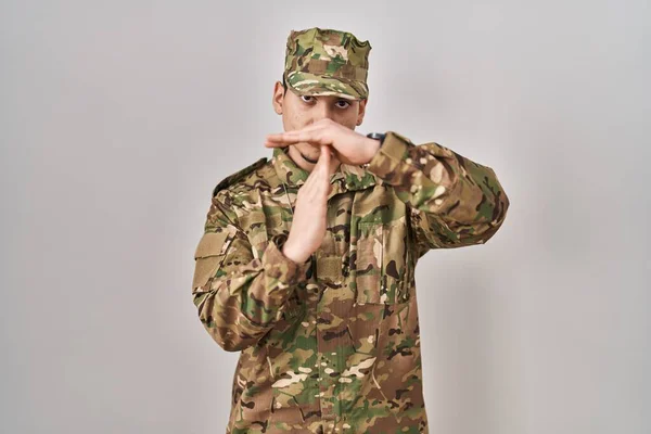 Young Arab Man Wearing Camouflage Army Uniform Doing Time Out — Stok fotoğraf