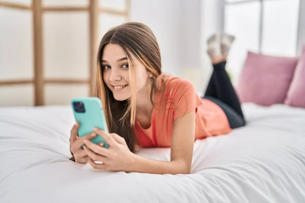 Adorable Girl Using Smartphone Lying Bed Bedroom — Stok fotoğraf