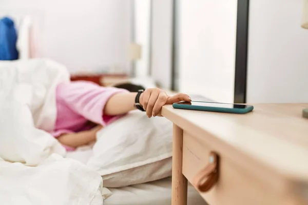 Girl Turning Smartphone Alarm Lying Bed Bedroom — Zdjęcie stockowe