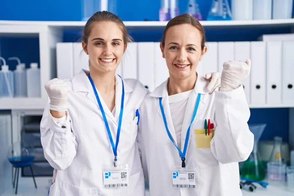 Two Women Working Scientist Laboratory Screaming Proud Celebrating Victory Success — Φωτογραφία Αρχείου