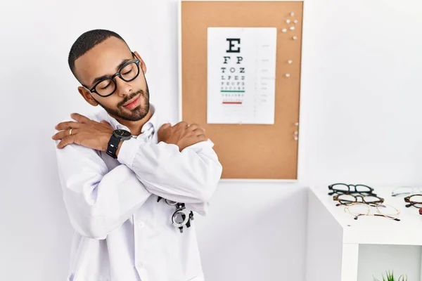 African American Optician Man Standing Eyesight Test Hugging Oneself Happy — Stockfoto