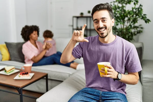 Hispanic Father Interracial Family Drinking Cup Coffee Smiling Confident Gesturing —  Fotos de Stock