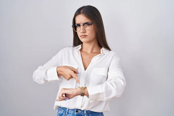 Young Brunette Woman Wearing Glasses Hurry Pointing Watch Time Impatience — Zdjęcie stockowe