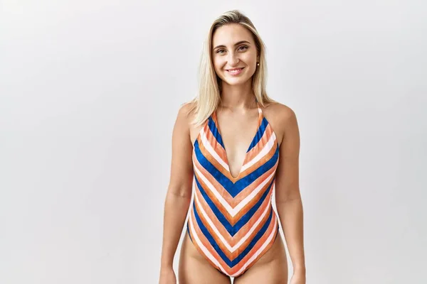 Young Blonde Woman Wearing Swimsuit Isolated Background Happy Cool Smile — 图库照片