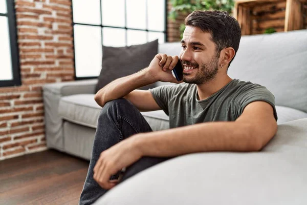 Young Hispanic Man Smiling Confident Talking Smartphone Home — Stok fotoğraf