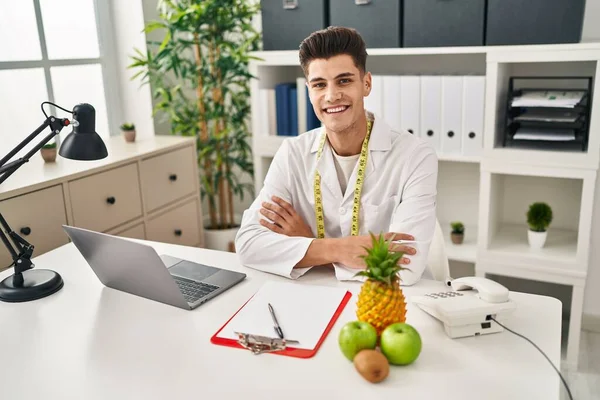 Young Hispanic Man Wearing Dietician Uniform Working Clinic —  Fotos de Stock
