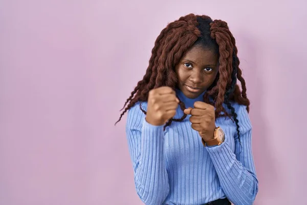 African Woman Standing Pink Background Ready Fight Fist Defense Gesture — Fotografia de Stock