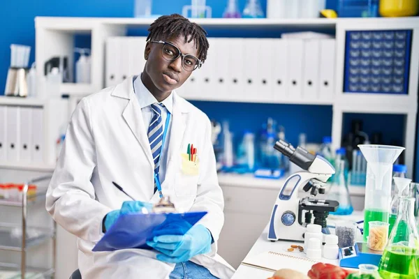 African American Man Scientist Writing Report Laboratory — Stock Photo, Image