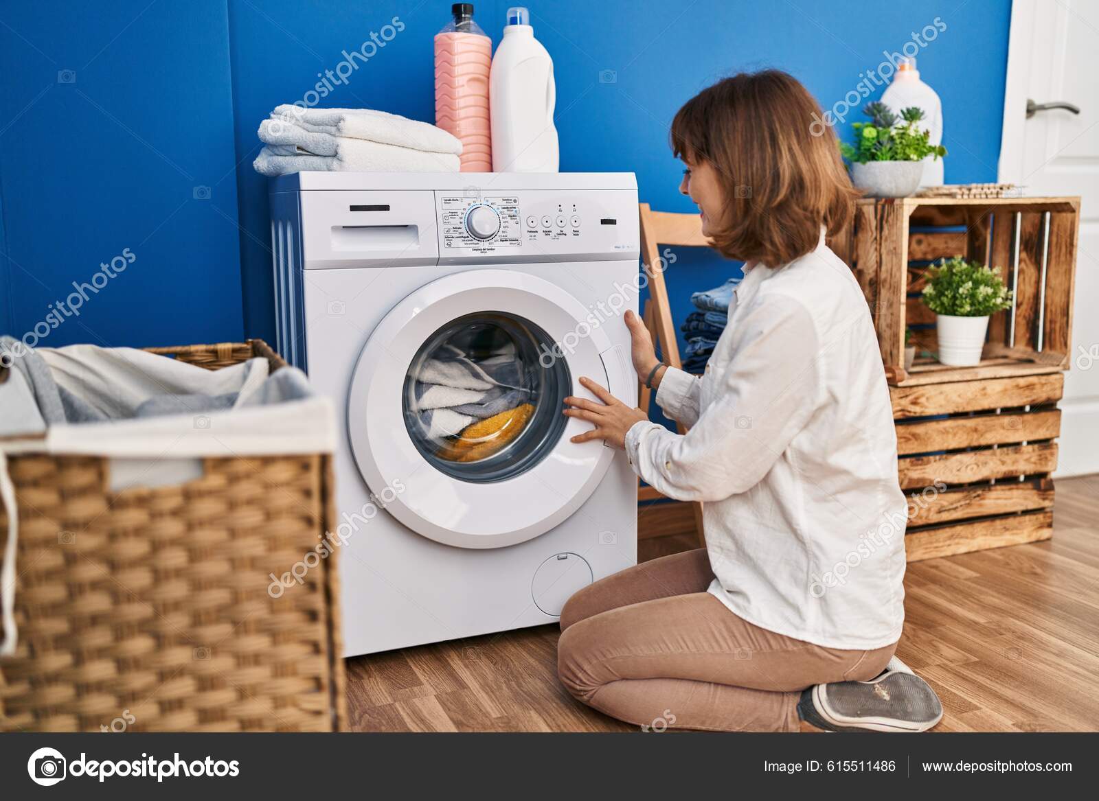 Young Caucasian Woman Washing Clothes Sitting Floor Laundry Room