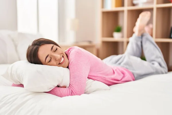 Young Beautiful Hispanic Woman Hugging Pillow Lying Bed Bedroom — Stock Photo, Image