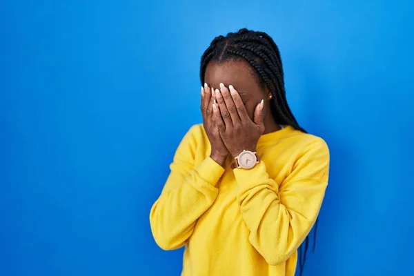 Beautiful Black Woman Standing Blue Background Sad Expression Covering Face — Zdjęcie stockowe