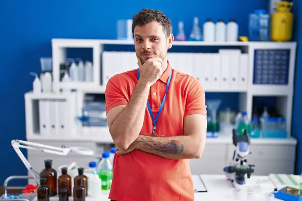 Young Hispanic Man Working Scientist Laboratory Looking Confident Camera Smile — Stock Photo, Image
