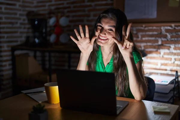 Young Teenager Girl Working Office Night Showing Pointing Fingers Number — Stockfoto