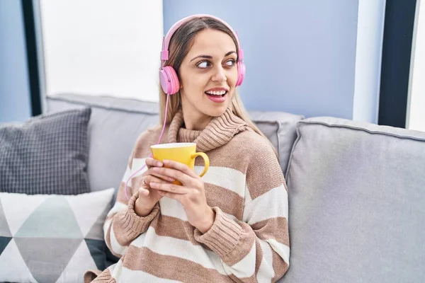 Young Woman Listening Music Drinking Coffee Home — Foto de Stock