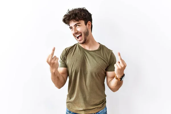 Hispanic Man Standing Isolated White Background Showing Middle Finger Doing — Stockfoto