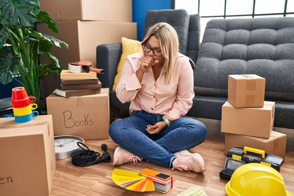 Young Hispanic Woman Moving New Home Sitting Floor Feeling Unwell —  Fotos de Stock