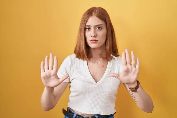 Young Redhead Woman Standing Yellow Background Moving Away Hands Palms — Stock Photo, Image