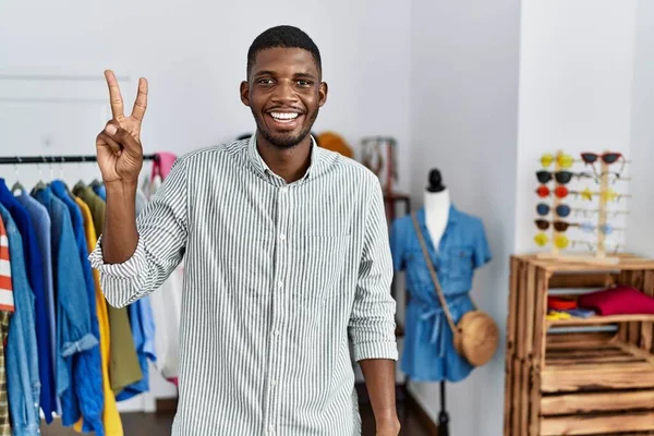 Young African American Man Working Manager Retail Boutique Showing Pointing — 图库照片