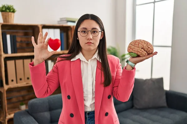 Young Latin Woman Working Couple Therapist Relaxed Serious Expression Face — Stockfoto