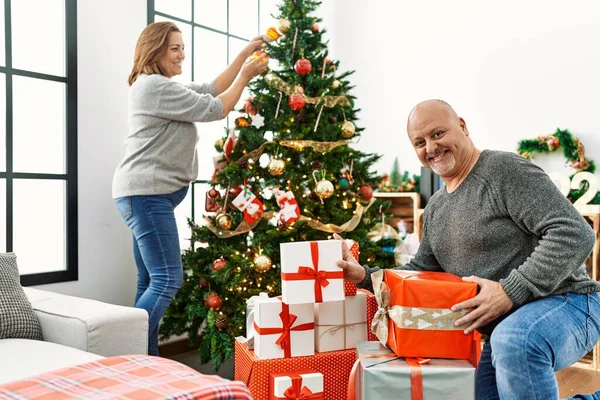 Happy Middle Age Couple Celebrating Christmas Home — стоковое фото