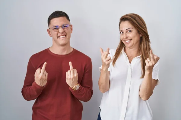 Mother Son Standing Together Isolated Background Showing Middle Finger Doing — 图库照片