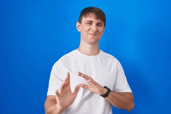 Caucasian Blond Man Standing Blue Background Disgusted Expression Displeased Fearful — Foto Stock