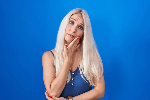 Caucasian Woman Standing Blue Background Thinking Looking Tired Bored Depression — Fotografia de Stock