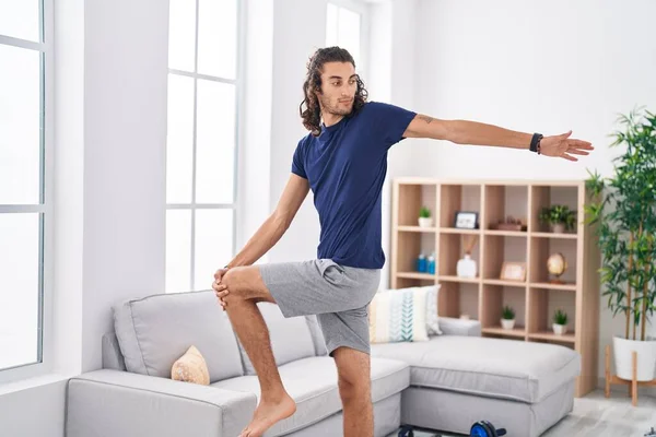 Young Hispanic Man Training Yoga Home — Stockfoto