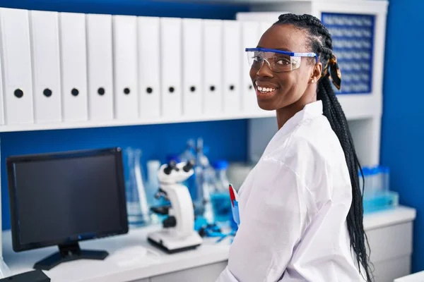 African American Woman Scientist Smiling Confident Laboratory — Fotografia de Stock