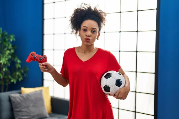 Young African American Woman Playing Football Video Game Looking Camera — Foto de Stock