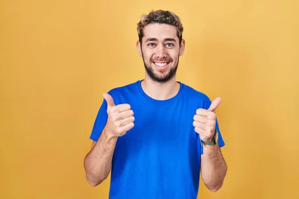 Hispanic Man Beard Standing Yellow Background Success Sign Doing Positive — Stockfoto