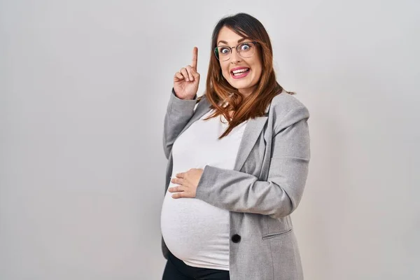 Pregnant Business Woman Standing White Background Pointing Finger Successful Idea — Stock Photo, Image
