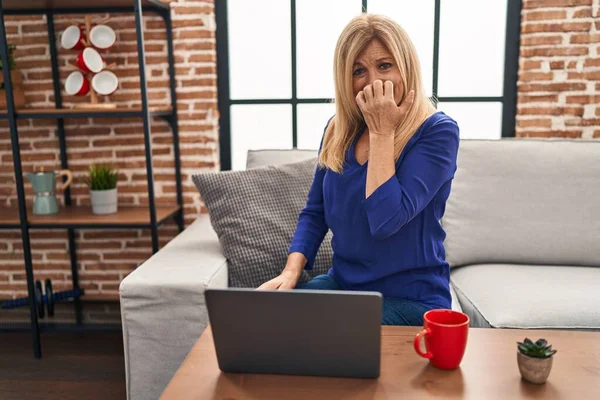 Middle Age Blonde Woman Using Computer Laptop Home Looking Stressed — Stock Photo, Image