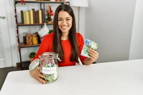 Young Latin Woman Holding Charity Jar Rands Banknotes Sitting Christmas — Stock Photo, Image