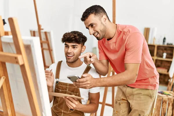 Two Hispanic Men Couple Smiling Confident Using Smartphone Drawing Art — Stock Photo, Image