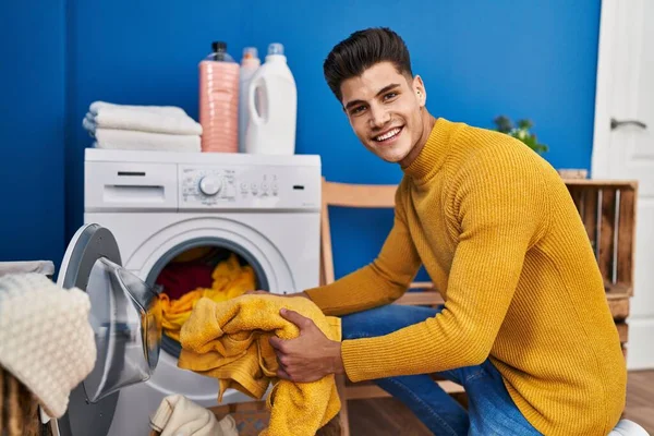 Young Hispanic Man Smiling Confident Washing Clothes Laundry — Fotografia de Stock